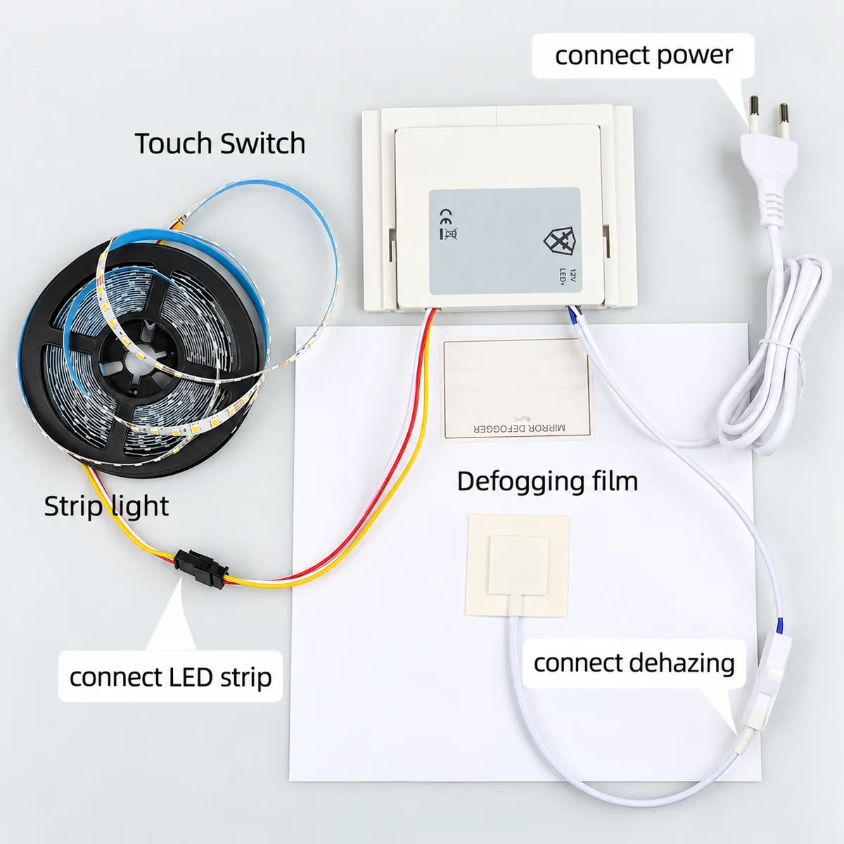 Our product photo: touch switch, LED strip and defogger pad wired as a kit.